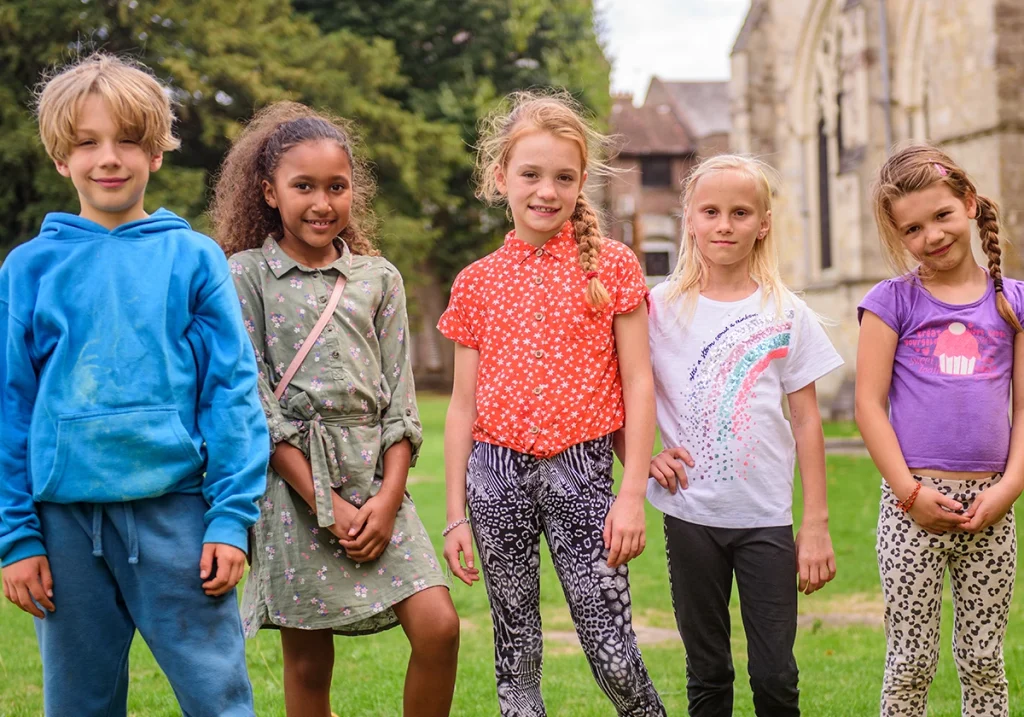 Foster children dressed in bright colours